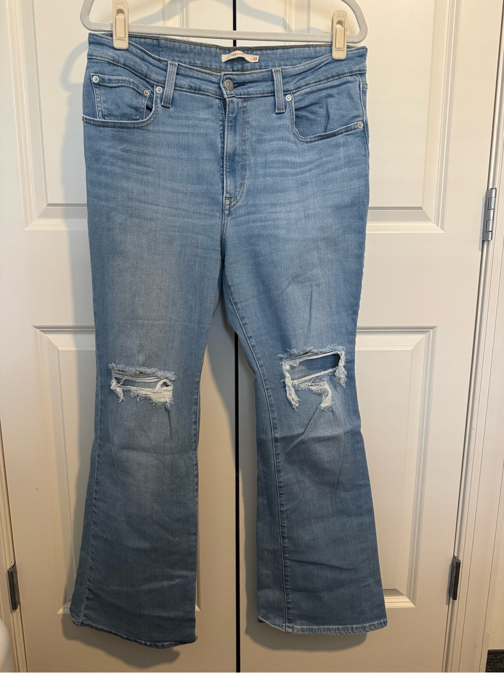 Levi's 729 stretch flare Light Blue Distressed Jeans with Knee Rips